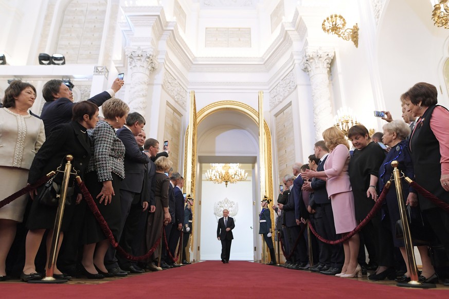 Vladimir Putin enters to take the oath during his inauguration ceremony as new Russia&#039;s president in the Grand Kremlin Palace in Moscow, Russia, Monday, May 7, 2018. Putin took the oath of office ...