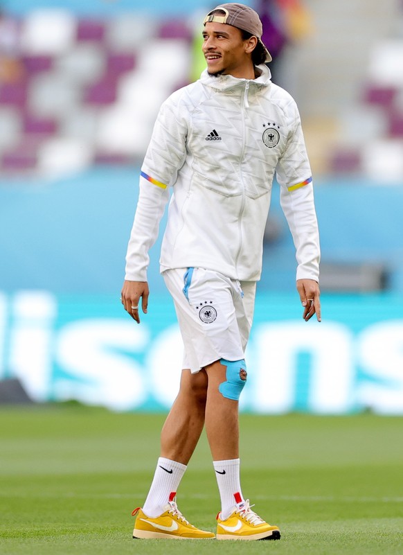 epa10322241 Leroy Sane of Germany inspects the pitch prior to the FIFA World Cup 2022 group E soccer match between Germany and Japan at Khalifa International Stadium in Doha, Qatar, 23 November 2022.  ...
