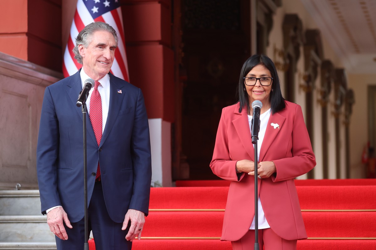 epa12795643 Venezuela's acting President Delcy Rodriguez (R) speaks alongside US Secretary of the Interior Doug Burgum in Caracas, Venezuela, 04 March 2026. The two officials met to discuss coope ...
