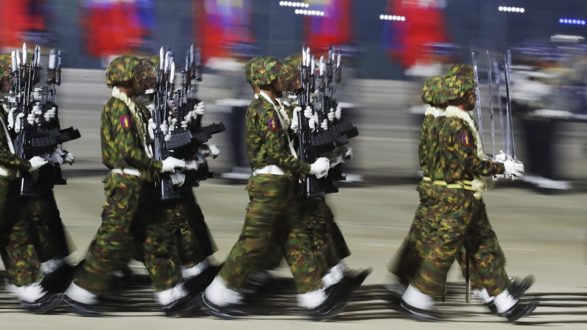 Myanmar military officers march during a parade to commemorate Myanmar's 79th Armed Forces Day, in Naypyitaw, Myanmar, Wednesday, March 27, 2024. (AP Photo/Aung Shine Oo)