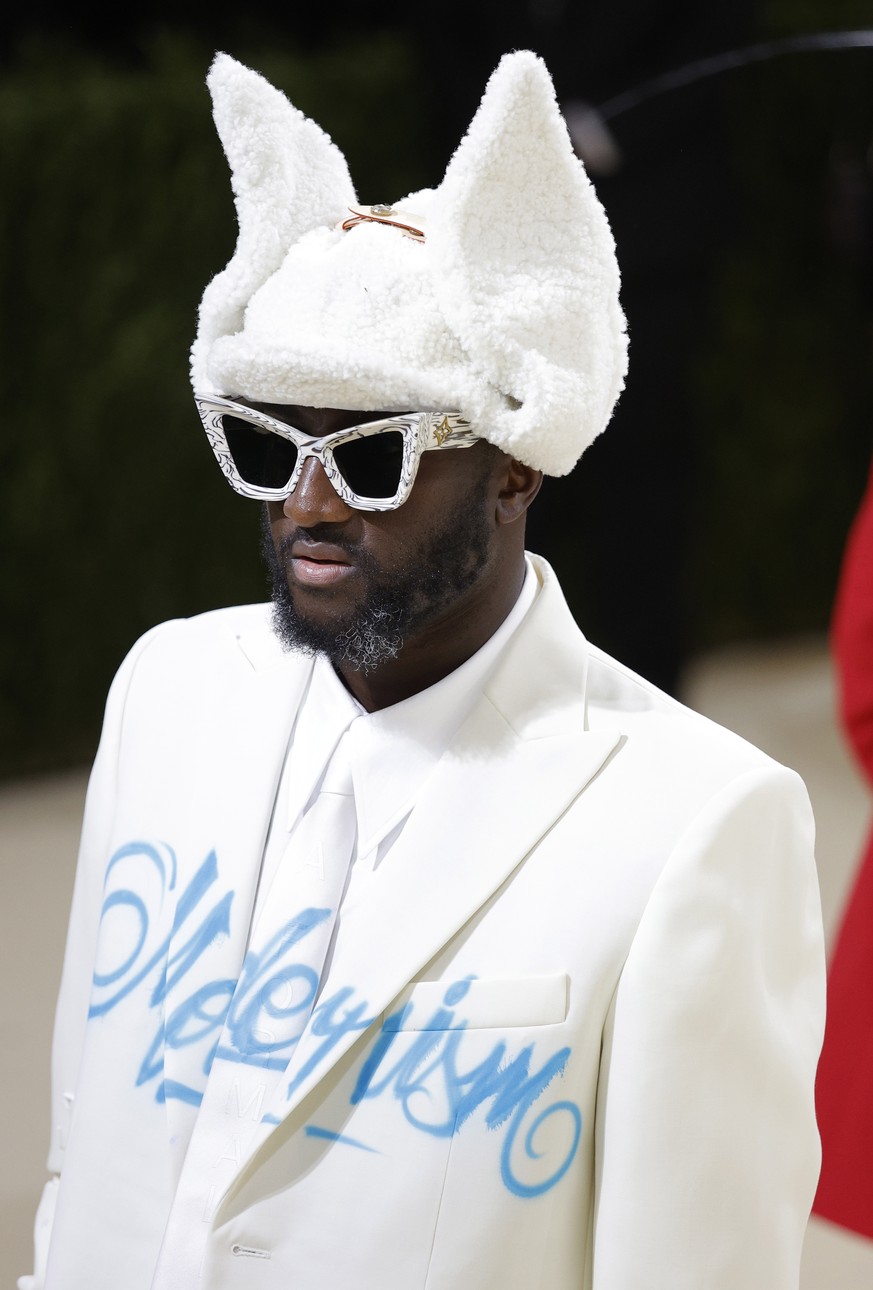 epa09466692 Virgil Abloh poses on the red carpet for the 2021 Met Gala, the annual benefit for the Metropolitan Museum of Art's Costume Institute, in New York, New York, USA, 13 September 2021. T ...