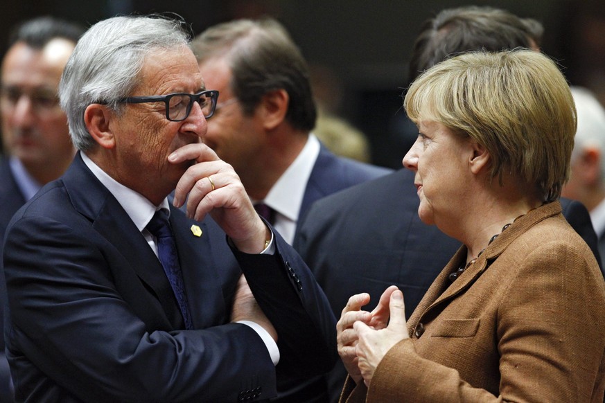 EU-Kommissionspräsident Jean-Claude Juncker mit der deutschen Bundeskanzlerin Angela Merkel.&nbsp;<br data-editable="remove">