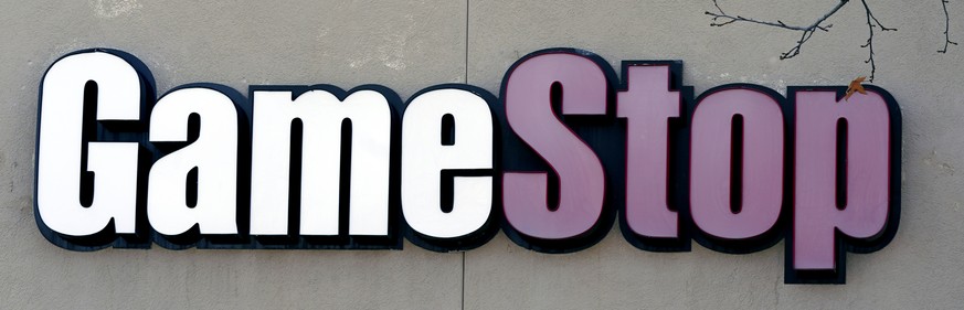 This Thursday, Jan. 28, 2021 photo shows a GameStop store sign in Dallas. The online trading platform Robinhood is moving to restrict trading in GameStop and other stocks that have soared recently due ...