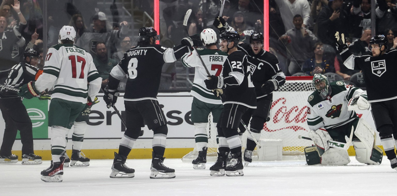 Los Angeles Kings left wing Kevin Fiala (22) celebrates after scoring a goal during the first period of an NHL hockey game against the Minnesota Wild, Wednesday, March 20, 2024, in Los Angeles. (AP Ph ...