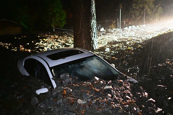 A car sits buried in mud after flooding Wednesday, Dec. 24, 2025, in Wrightwood, Calif. (AP Photo/Wally Skalij)
Extreme Weather California