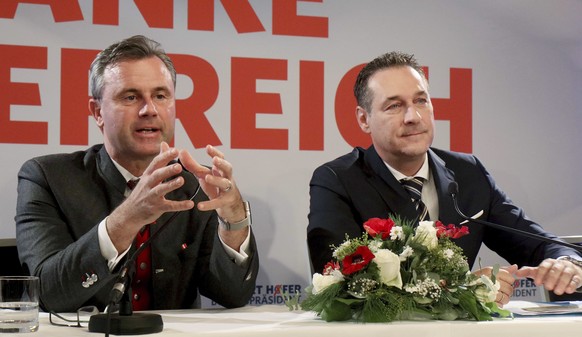 Presidential candidate Norbert Hofer of Austria's Freedom Party, FPOE, and Heinz-Christian Strache, chairman of the anti-migrant and anti-EU Freedom Party FPOE, from left, attend a news conferenc ...