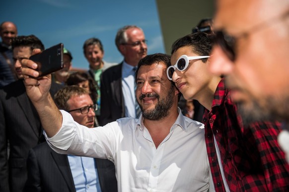 epa07554105 Interior Minister Matteo Salvini poses for a &#039;selfie&#039; with his supporters on the occasion of an election rally in Giussano, northern Italy, 07 May 2019. Salvini has defended prob ...