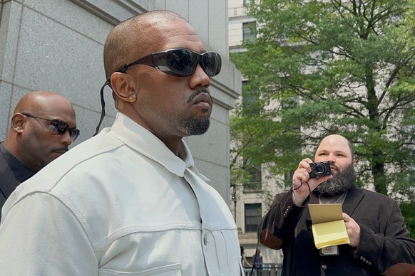 Ye, the rapper formerly known as Kanye West, leaves federal court during the trial of Sean "Diddy" Combs in New York, Friday, June 13, 2025. (AP Photo/Larry Neumeister)
APTOPIX Sexual Miscon ...