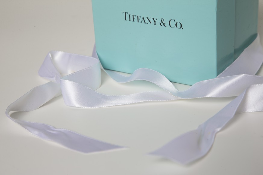 In this Monday, May 22, 2017, photo, a gift box from Tiffany &amp; Co. is arranged for a photo in Surfside, Fla. Tiffany &amp; Co. reports earnings, Wednesday, May 24, 2017. (AP Photo/Wilfredo Lee)