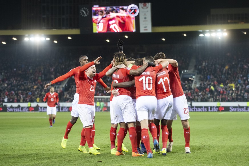 Switzerland celebrate the 5:2 goal of Haris Seferovic during the UEFA Nations League soccer match between Switzerland and Belgium at the swissporarena stadium in Lucerne, Switzerland, on Sunday, Novem ...