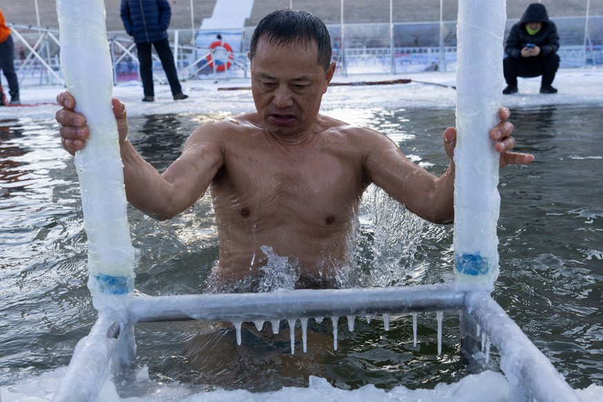 A winter swimmer climbs out a pool after jumping into icy water in Harbin in China's Heilongjiang province on Monday, Jan. 5, 2026. (AP Photo/Ng Han Guan)
China Ice and Snow Festival