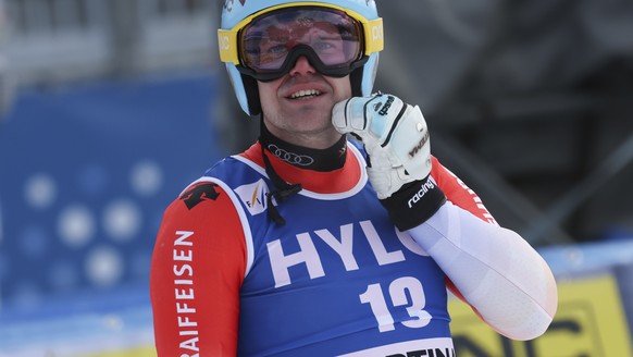 Switzerland&#039;s Stefan Rogentin arrives at the finish area during an alpine ski, men&#039;s World Cup super-G, in Cortina d&#039;Ampezzo, Italy, Saturday, Jan. 28, 2023. (AP Photo/Alessandro Trovat ...