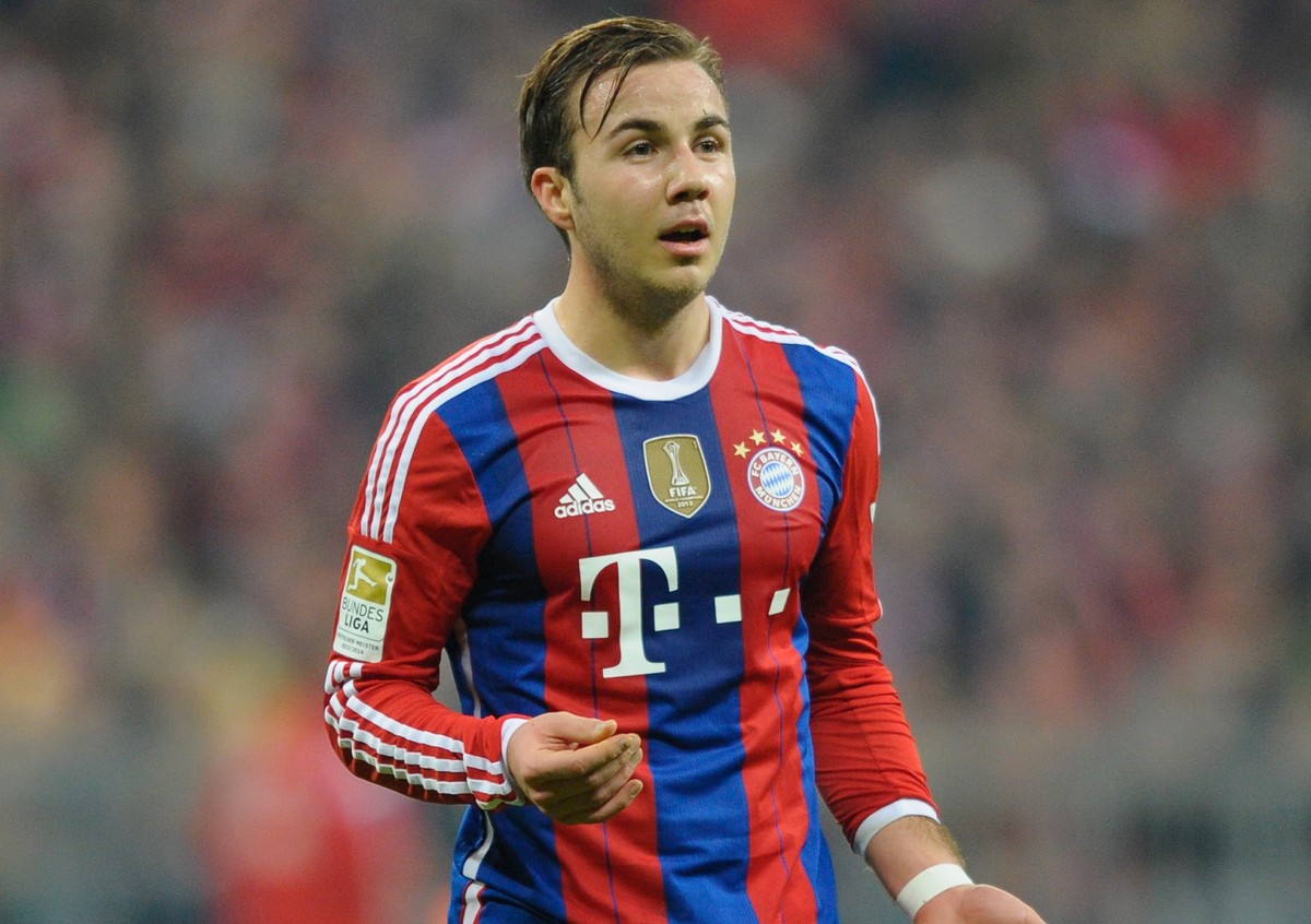 MUNICH, GERMANY - DECEMBER 16: Mario Goetze of Muenchen reacts during the Bundesliga match between FC Bayern Muenchen and SC Freiburg at Allianz Arena on December 16, 2014 in Munich, Germany. (Photo b ...