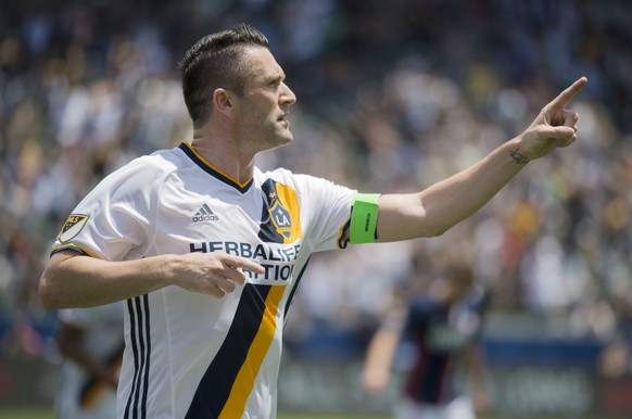 May 8, 2016; Carson, CA, USA; LA Galaxy forward Robbie Keane (7) celebrates after scoring a goal against the New England Revolution during the first half at StubHub Center. Mandatory Credit: Kelvin Ku ...