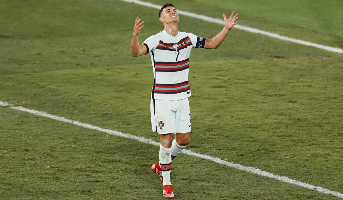 Portugal's Cristiano Ronaldo reacts in frustration during the Euro 2020 soccer championship round of 16 match between Belgium and Portugal at La Cartuja stadium in Seville, Spain, Sunday, June 27 ...