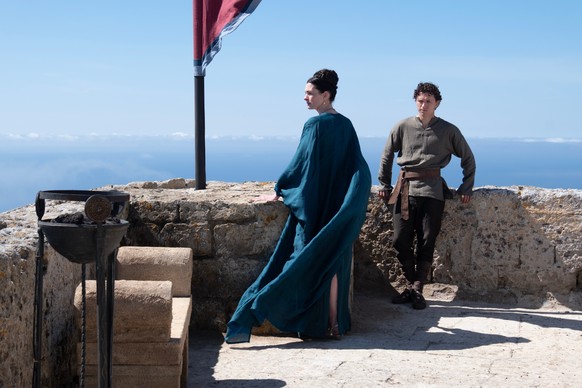 This image released by Universal Pictures shows, from left, Anne Hathaway as Penelope, and Tom Holland as Telemachus, in a scene from "The Odyssey." (Melinda Sue Gordon/Universal Pictures vi ...