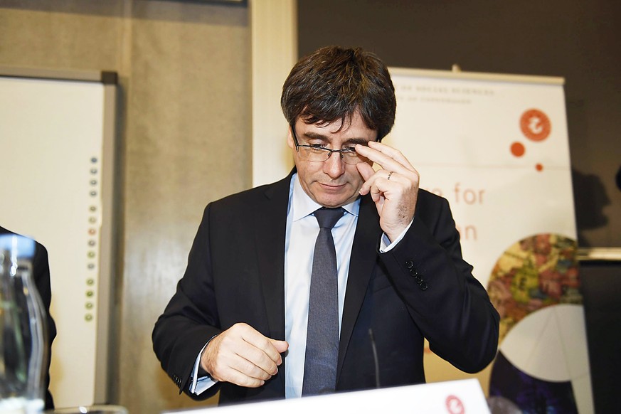 epa06465279 Former Catalan President Carles Puigdemont takes part in a debate at The Political Science Department at the University of Copenhagen in Copenhagen, Denamrk, 22 January 2018. Mr Puigdemont ...