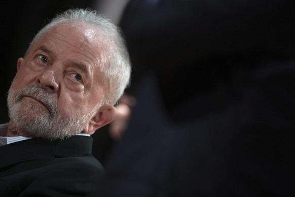 epa10298574 Brazilian President-elect Luiz Inacio Lula da Silva looks on during a meeting with parliamentarians at the Banco do Brasil Cultural Center (CCBB) in Brasilia, Brazil, Nov. 10, 2022. Cock...