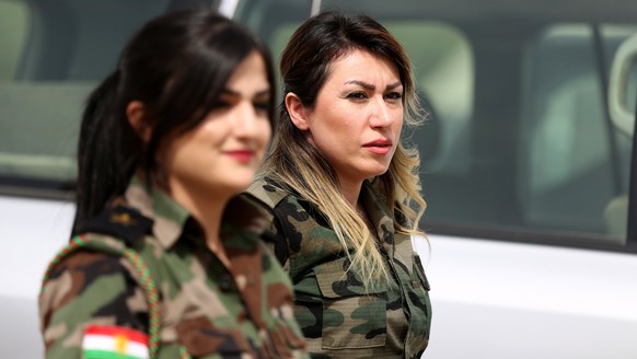 epa06226362 Kurdish Peshmerga soldiers arrive to vote during Kurdistan independence referendum in Erbil, Kurdistan region in northern Iraq, 25 September 2017. The Kurdistan region is an autonomous reg ...