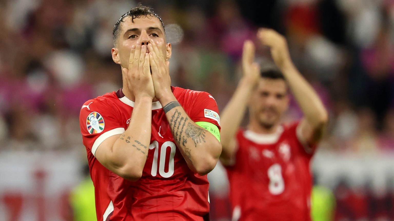 epa11433203 Granit Xhaka of Switzerland reacts after missing an opportunity to score during the UEFA EURO 2024 group A soccer match between Switzerland and Germany, in Frankfurt am Main, Germany, 23 J ...
