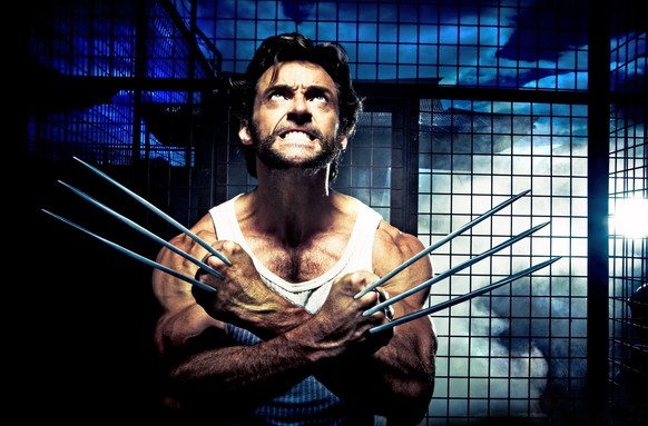In this film publicity image released by 20th Century Fox, Hugh Jackman unleashes his adamantium claws in a scene from &quot;Wolverine.&quot; (AP Photo/20th Century Fox, Michael Muller) ** NO SALES **
