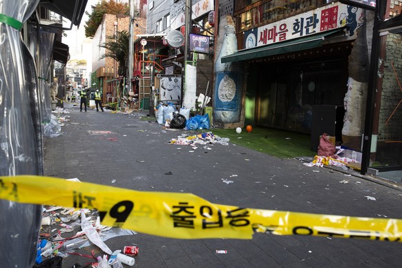 epa10274759 The cordoned off area where a deadly stampede took place the previous day in Seoul, South Korea, 30 October 2022. According to the National Fire Agency, at least 151 people were killed and ...