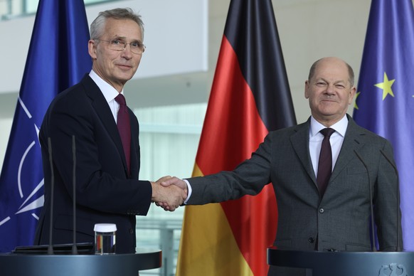 epa11302660 German Chancellor Olaf Scholz (R) and NATO Secretary General Jens Stoltenberg shake hands at the end of a joint press statement in Berlin, Germany, 26 April 2024. Stoltenberg is on a two-d ...