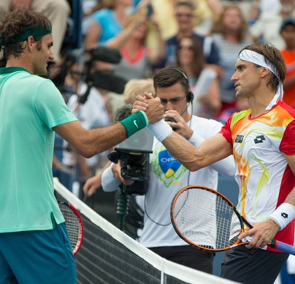 17 August 2014: Roger Federer (SUI) (left) shakes hands with David Ferrer (ESP) after the championship match of The Western and Southern Open in Mason, Ohio. . TENNIS: AUG 17 Western and Southern Open ...