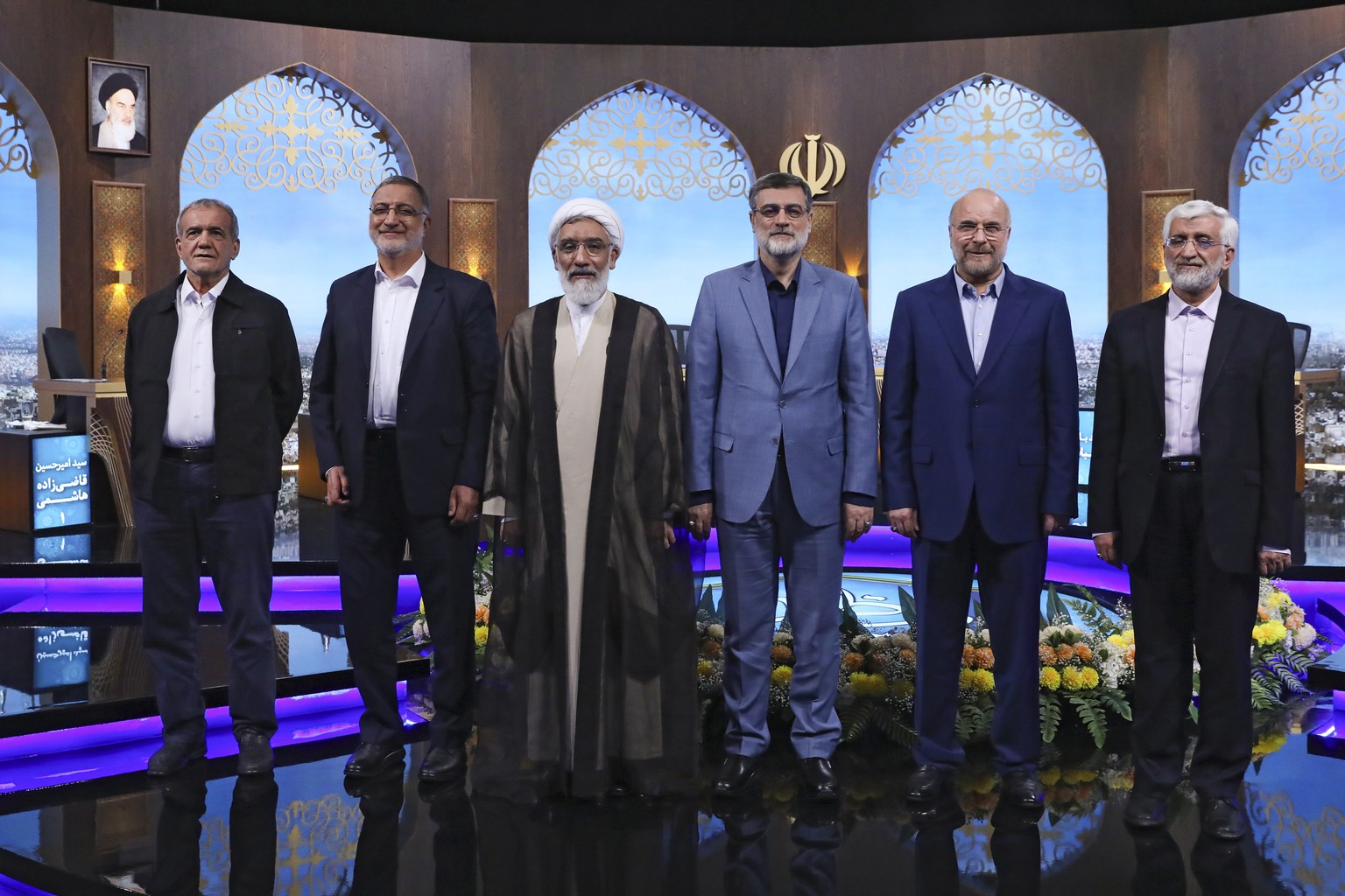 FILE - In this picture made available by Iranian state-run TV, IRIB, presidential candidates for June 28, election from left, Masoud Pezeshkian, Alireza Zakani, Mostafa Pourmohammadi, Amirhossein Ghaz ...