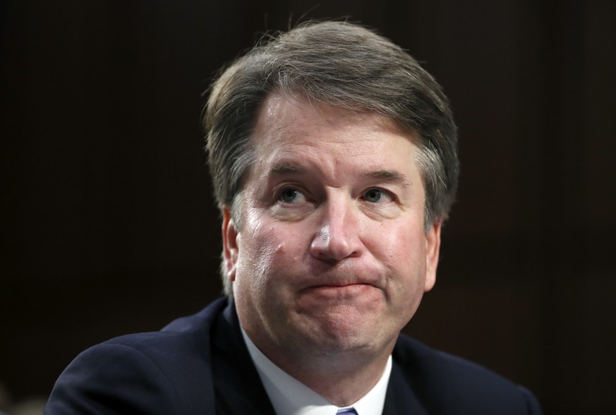 In this Sept. 6, 2018 photo, Supreme Court nominee Brett Kavanaugh reacts as he testifies after questioning before the Senate Judiciary Committee on Capitol Hill in Washington. Official Washington is  ...