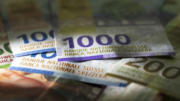 Detail view of the nineth Swiss banknote series: ten, twenty and fifty, hundred, two hundred and thousand Swiss franc note, photographed on November 7, 2019. (KEYSTONE/Gaetan Bally)

Detailansicht der ...