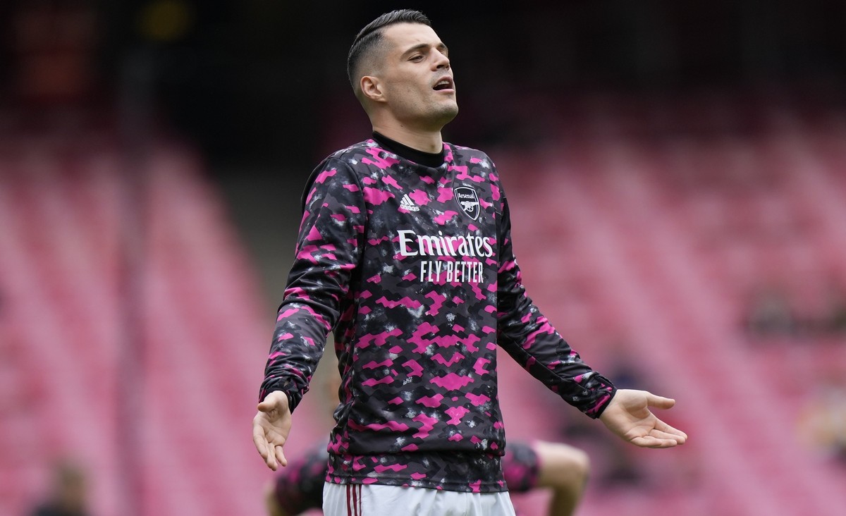 Arsenal's Granit Xhaka warms up before the English Premier League soccer match between Arsenal and Brighton &amp; Hove Albion at Emirates Stadium in London, England, Sunday, May 23, 2021. (AP Pho ...