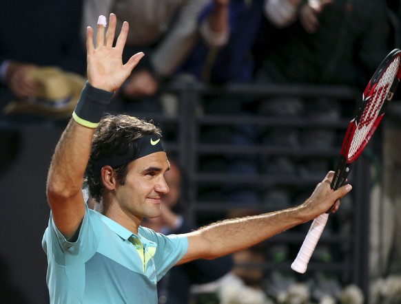 Roger Federer of Switzerland celebrates after winning his men&#039;s semi-final match against Stan Wawrinka of Switzerland at the Rome Open tennis tournament in Rome, Italy, May 16, 2015. REUTERS/Stef ...