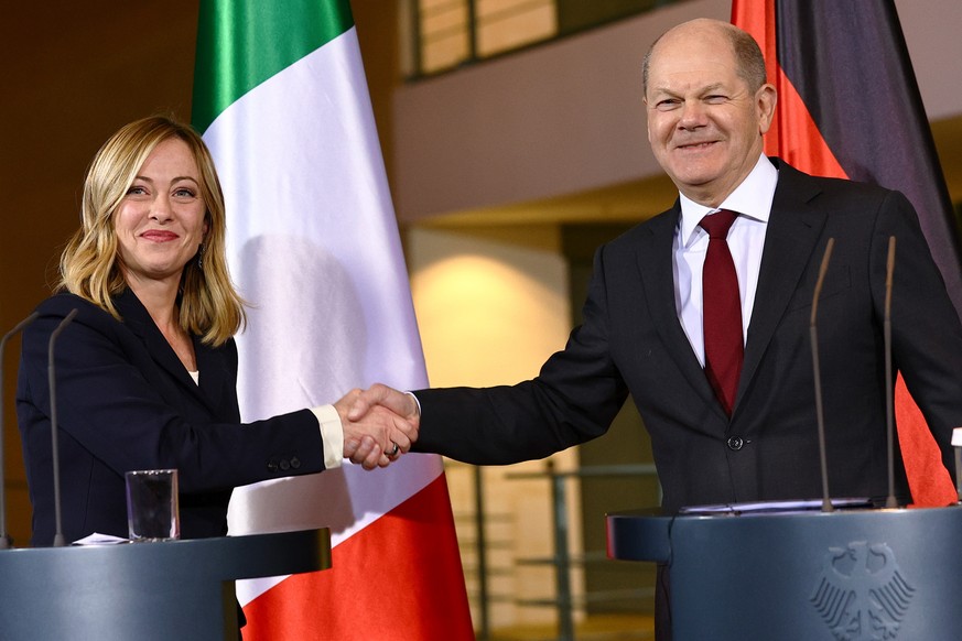 epa10989849 German Chancellor Olaf Scholz (R) shakes hands with Italian Prime Minister Giorgia Meloni after a press conference prior to the German-Italian government consultations at the Chancellery in Be...