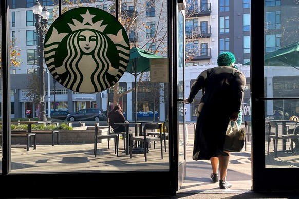 FILE - A costumer exits a Starbucks store in Oakland, Calif., Thursday, Jan. 16, 2025. (AP Photo/Godofredo A. Vásquez, File)
Starbucks