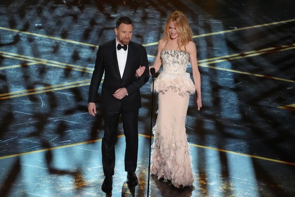 Ewan McGregor, left, and Nicole Kidman present the award for best picture during the Oscars on Sunday, March 15, 2026, at the Dolby Theatre in Los Angeles. (AP Photo/Chris Pizzello)
Ewan McGregor,Nico ...