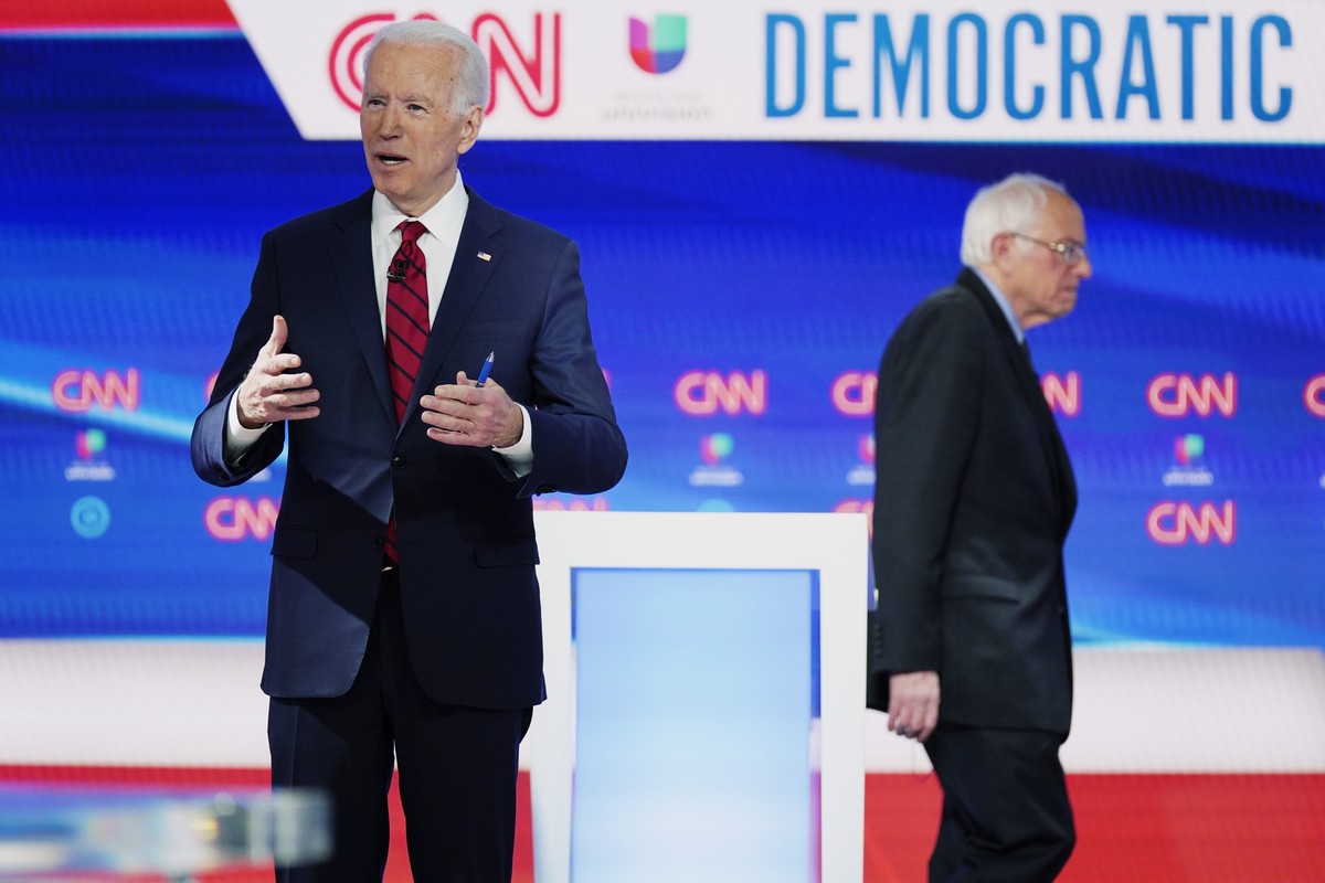 In this Sunday, March 15, 2020, photo, former Vice President Joe Biden prepares for a Democratic presidential primary debate with Sen. Bernie Sanders, I-Vt., at CNN Studios in Washington. Biden's ...