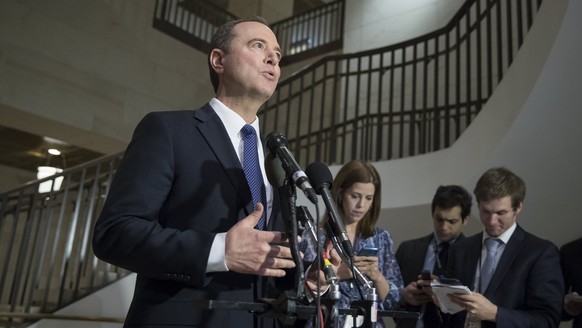 epa06498996 Democratic Representative from California and Ranking Member of the House Permanent Select Committee on Intelligence Adam Schiff (C) delivers remarks to members of the news media following ...