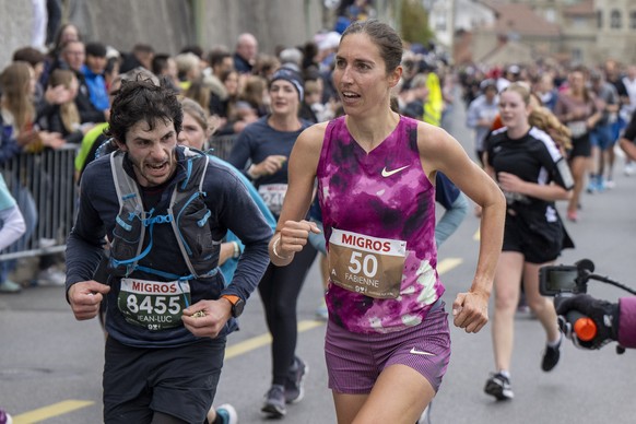 Die Schweizerin Fabienne Schlumpf, 2. Platz, bei der 90. Ausgabe des Murtenlaufs am Sonntag, 6. Oktober 2024, in Fribourg. Die Strecke fuehrt von Murten nach Fribourg und betraegt 17.170 Kilometer..(K ...