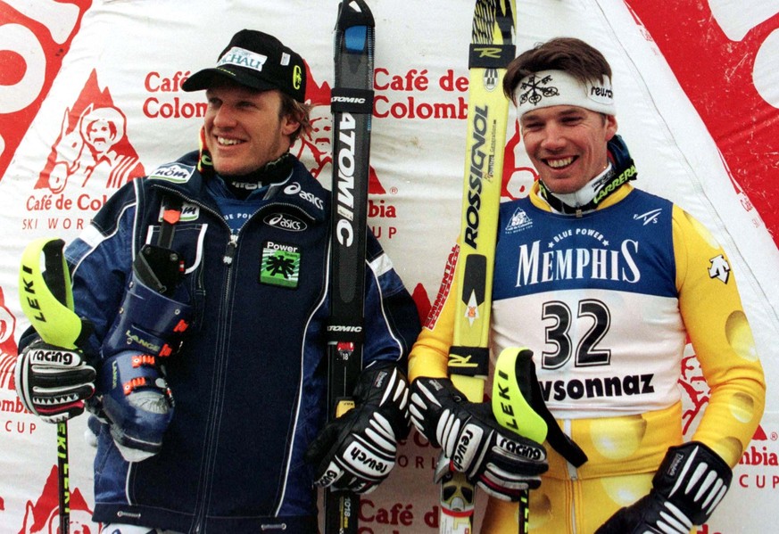 Hermann Maier, left, of Austria, the winner, and Bruno Kernen, of Switzerland second placed in the combined event of the men's World Cup concluded by a slalom in Veysonnaz, Switzerland, Sunday, J ...