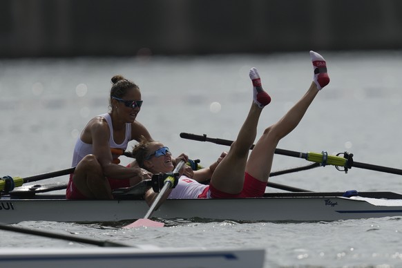 Patricia Merz and Frederique Rol of Switzerland react after competing in the lightweight women&#039;s rowing double sculls final at the 2020 Summer Olympics, Thursday, July 29, 2021, in Tokyo, Japan.  ...