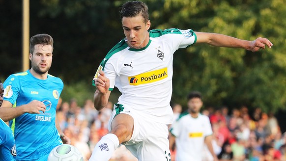 epa06958869 Hastedt&#039;s Dickson Chukwudi Onyeulo (L) in action against Moenchengladbach&#039;s Florian Neuhaus (R) during the German DFB Cup first round soccer match between BSC Hastedt and Borussi ...