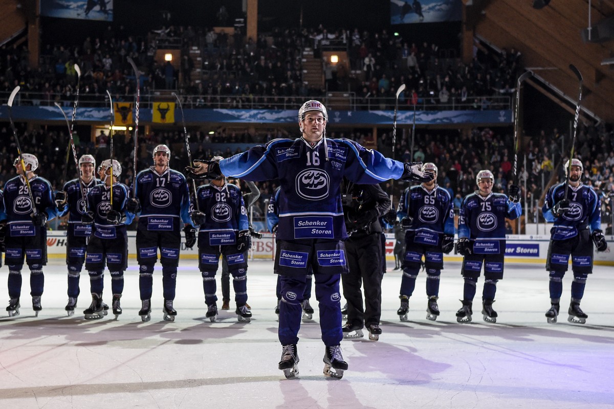 Ambri's Dominik Zwerger and the team after winning the game between HC Ambri-Piotta and TPS Turku, at the 93th Spengler Cup ice hockey tournament in Davos, Switzerland, Saturday, December 28, 201 ...