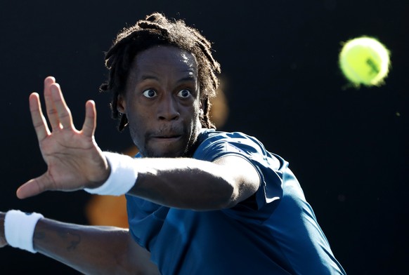 France&#039;s Gael Monfils looks to make a return to Spain&#039;s Jaume Munar during their first round match at the Australian Open tennis championships in Melbourne, Australia, Tuesday, Jan. 16, 2018 ...