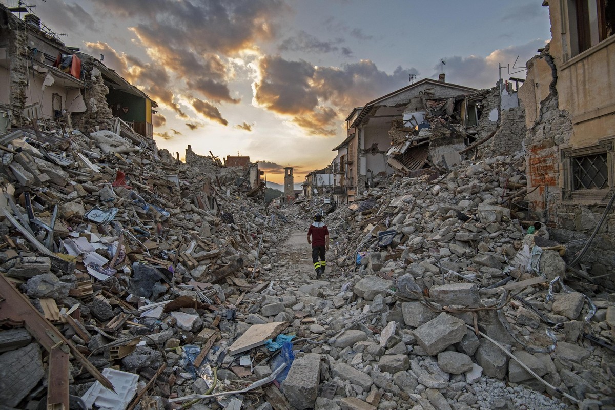 epa13178409 (FILE) - Rescue teams continue their operations in the rubble of the largely destroyed Lazio mountain village of Amatrice, Italy, 01 September 2016 (reissued on 19 August 2026). On 24 Augu ...