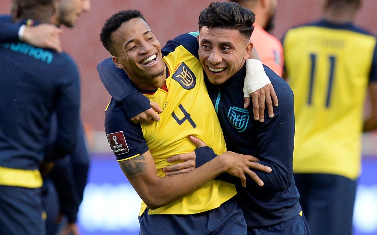 epa09444310 Ecuador&#039;s Byron Castillo (L) celebrates with his teammate Joao Rojas victory against Paraguay after the end of a match amid the Conmebol qualifiers for the Qatar 2022 World Cup, at th ...
