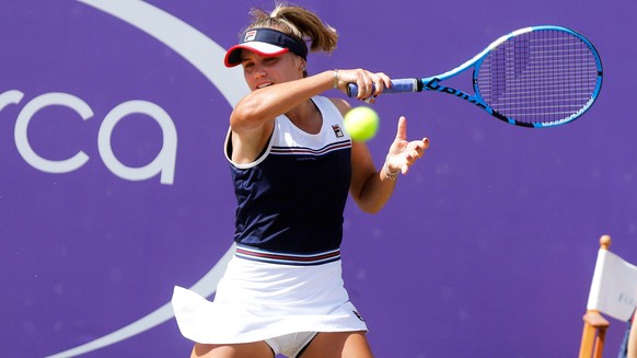 epa07668515 Sofia Kenin of the USA in action against Belinda Bencic of Switzerland during their final match of the WTA Mallorca Open tennis tournament at Santa Ponsa&#039;s Club in Mallorca, Balearic  ...