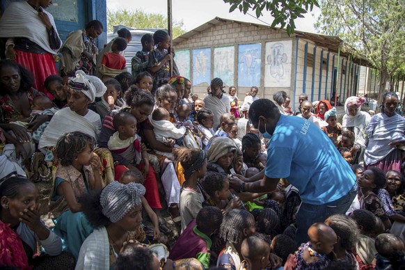 UNICEF Nutrition Specialist Joseph Senesie screens children for malnutrition in Adikeh, in the Wajirat district of the Tigray region of northern Ethiopia Monday, July 19, 2021. For months, the United  ...