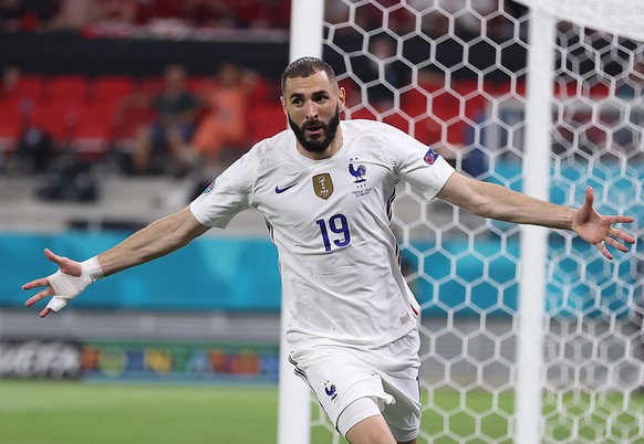 epa09297561 Karim Benzema of France celebrates after scoring his team&#039;s second goal during the UEFA EURO 2020 group F preliminary round soccer match between Portugal and France in Budapest, Hunga ...