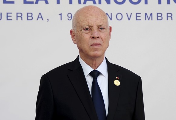 Tunisian President Kais Saied receives participants during the opening ceremony of the 18th Francophone Summit, in Djerba, Tunisia, Saturday, Nov. 19, 2022. (AP Photo/Hassene Dridi)